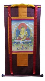 Assorted Yellow Zambala thanka with brocade